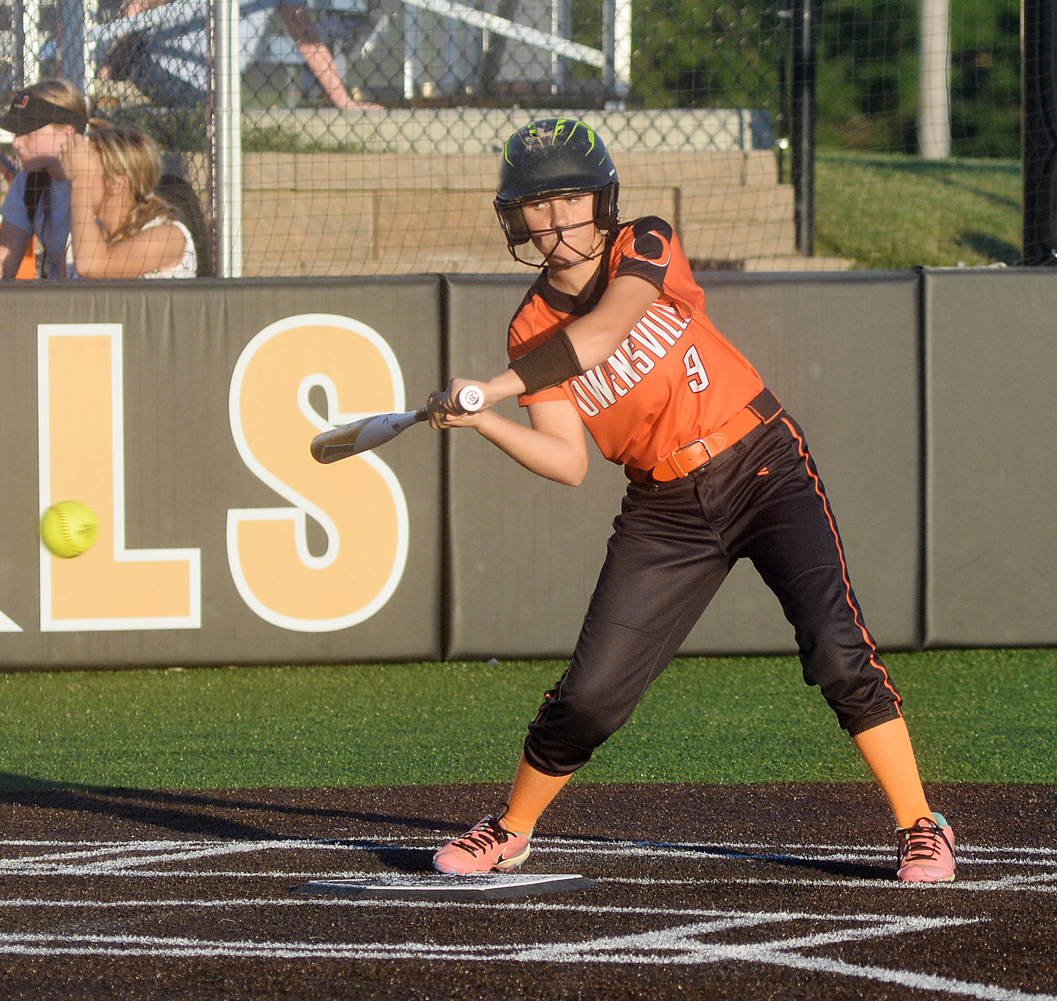 Trinity Rossi pulls her bat back from an outside pitch for a ball during Owensville’s 12-7 victory in junior-varsity softball action last Thursday night at OHS Field against the visiting Union’s JV Lady Wildcats.